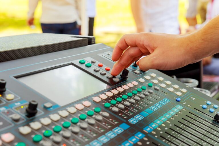 sound mixer in action, hand Music console